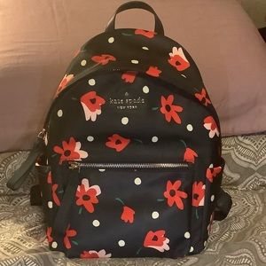 Navy blue and floral Kate Spade mini backpack.